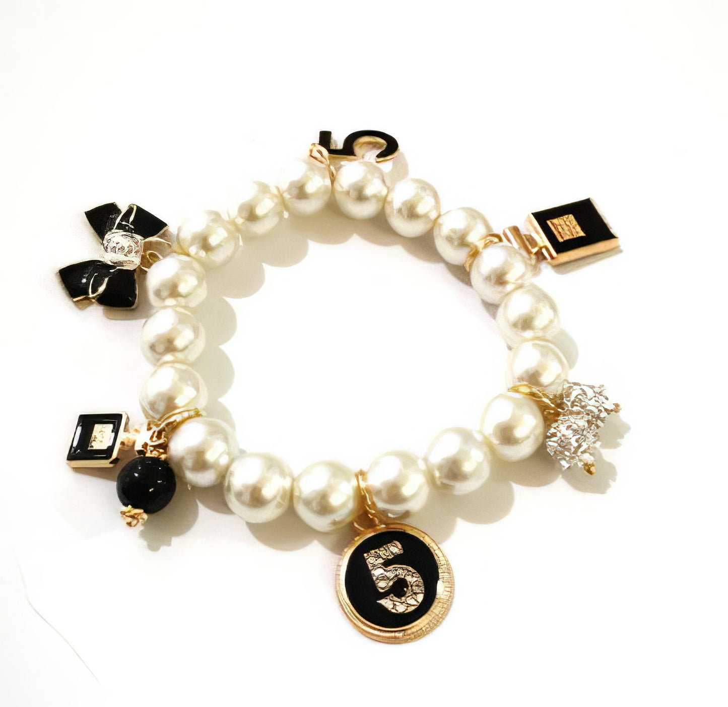 Elastic Pearl Charm Bracelet in Gold with Perfum bottle, number 5, bow, rhinestone Accents