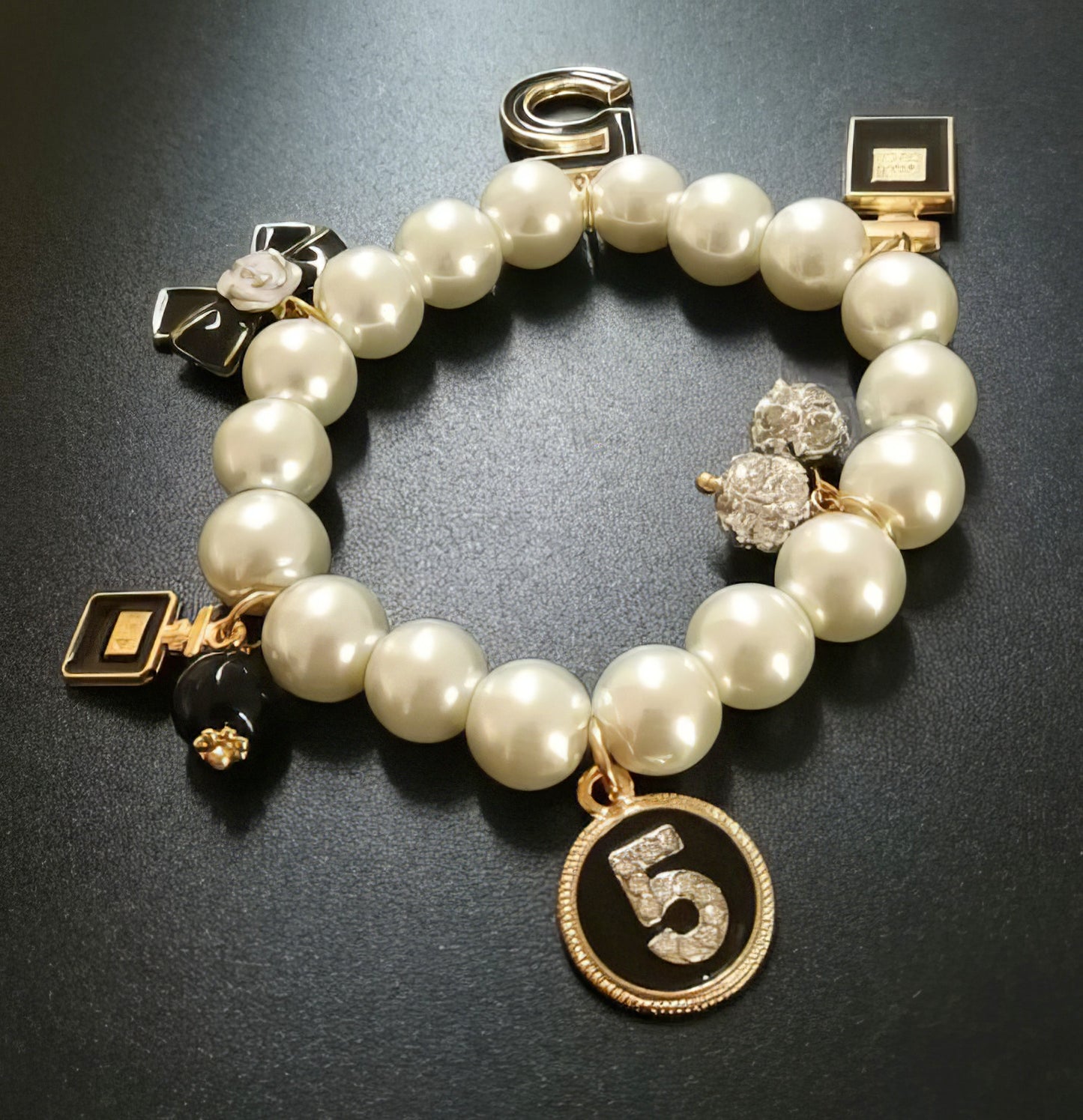 Elastic Pearl Charm Bracelet in Gold with Perfum bottle, number 5, bow, rhinestone Accents